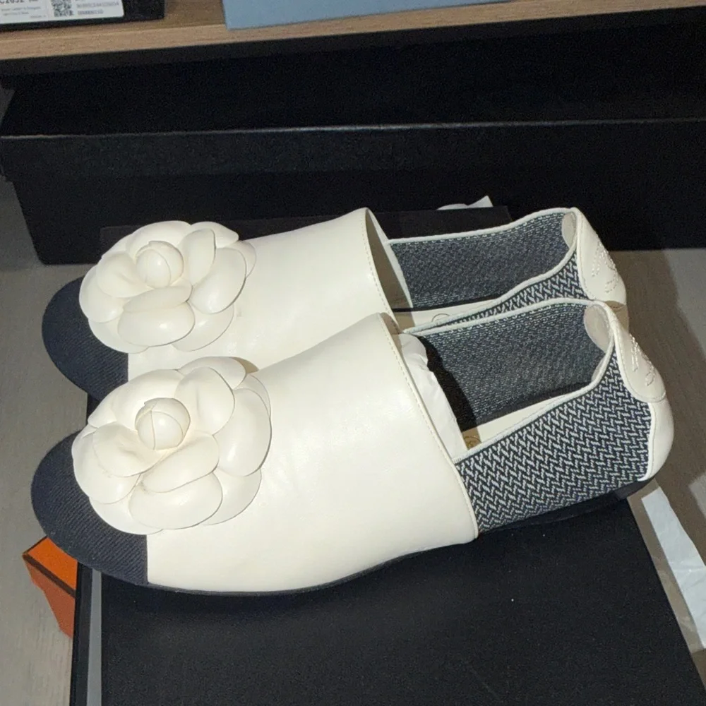 CHANEL Cream and Black Leather Camellia Slip-On Moccasins